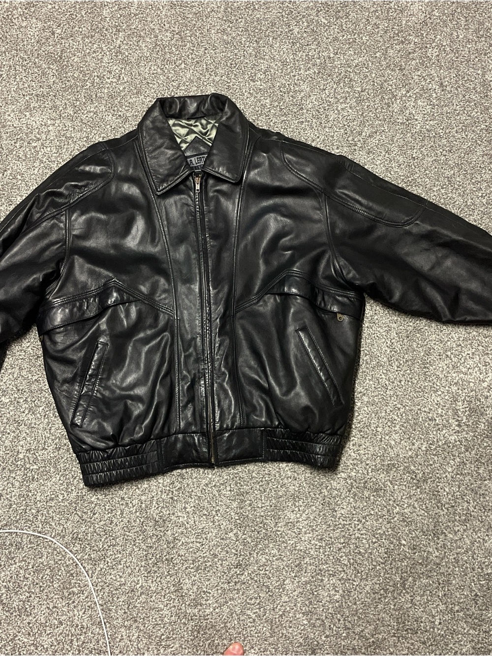 Classic Black Leather Bomber Jacket with Ribbed Hem